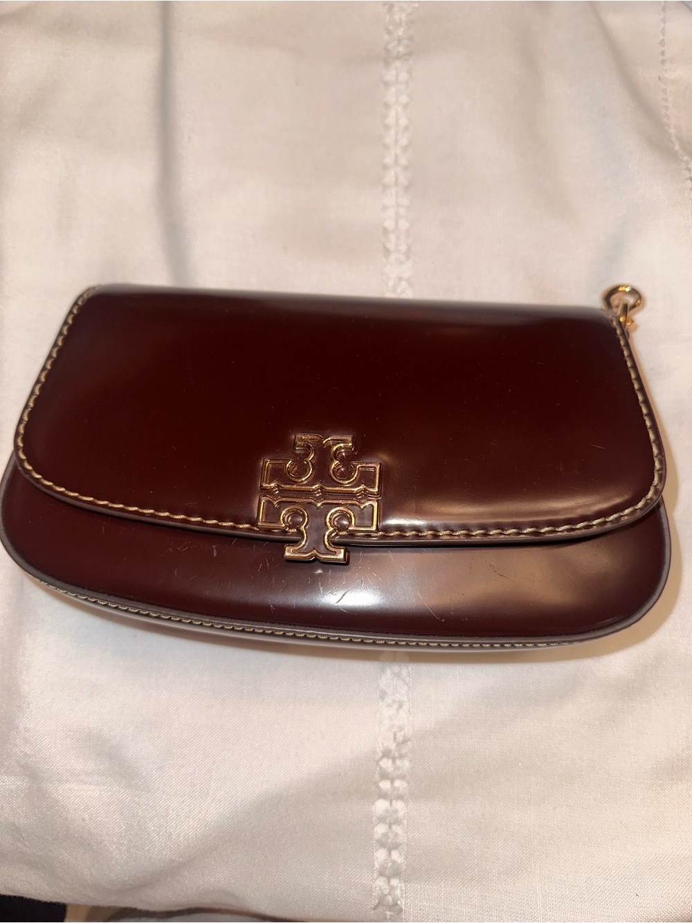 Tory Burch glossy dark brown leather clutch with gold logo